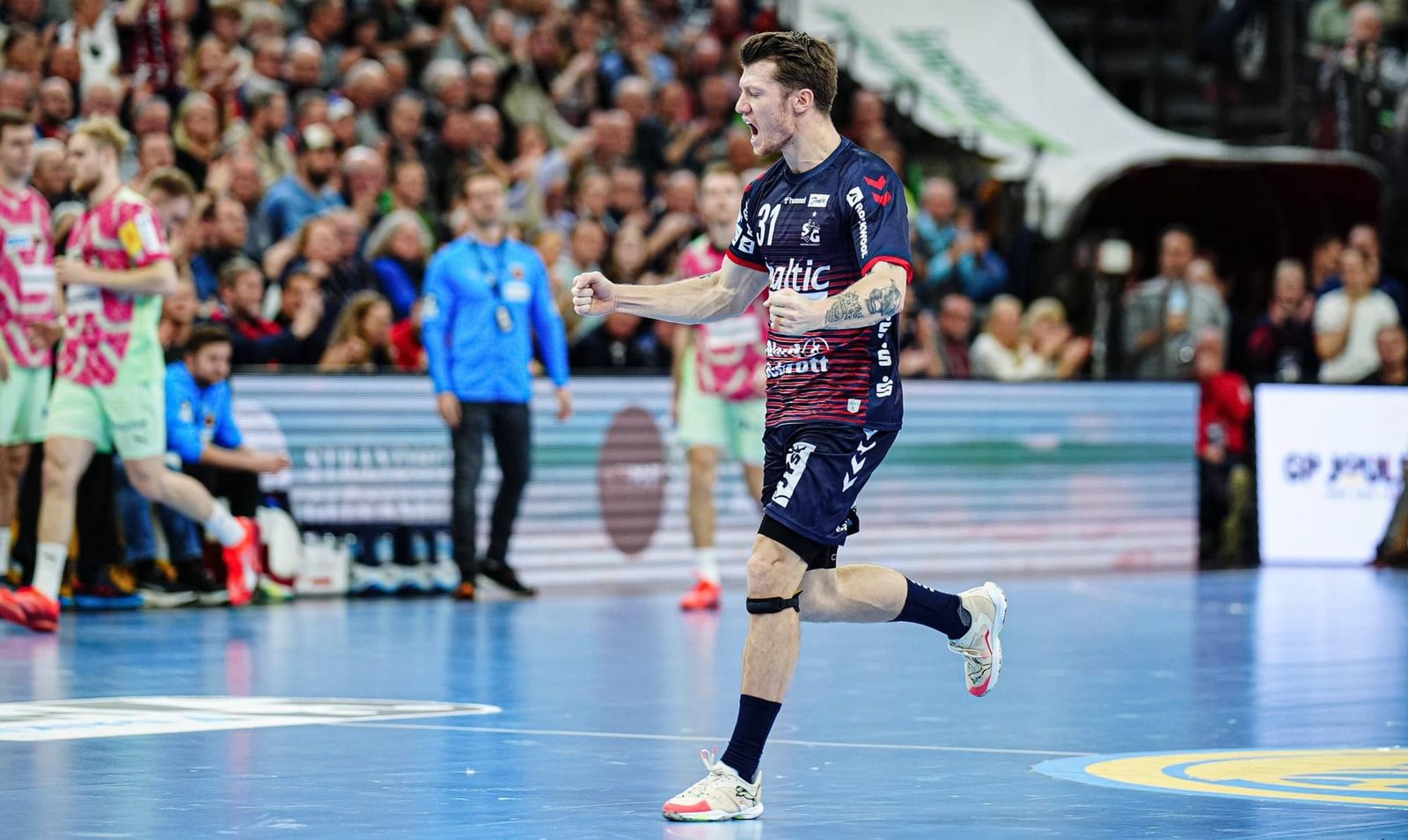 Flensburg ringt Füchse nieder - Melsungen bleibt vorne